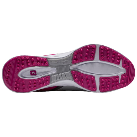 A shoe sole is displayed featuring a pink and white rubber design equipped with grip patterns and text indicating enhancements for stability and bridges, set against a plain background.