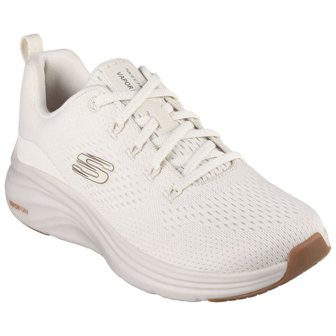 A white athletic shoe with a textured upper and flexible outsole is positioned prominently displaying its lace-up design and logo while highlighting its sporty and modern style suitable for casual wear or exercise.