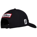 A black golf cap features a white brim and embroidered logos on the sides including Titleist in red and white and FJ in white against the black fabric.