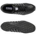 A black tennis shoe with white stripes is displayed prominently with the top view showcasing laces and an inner label. The sole features a textured rubber pattern for grip.