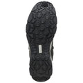 A shoe sole is displayed featuring a rugged, patterned texture designed for traction. It lies flat against a neutral background, showcasing its durable design for outdoor activities.