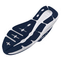 A sneaker sole features a textured rubber design with contrasting navy and white colors highlighting traction patterns intended for grip during physical activity on various surfaces.