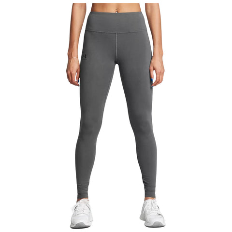 Gray athletic leggings are being worn by a person standing still against a white background highlighting a sporty and casual appearance suitable for workouts or everyday wear.