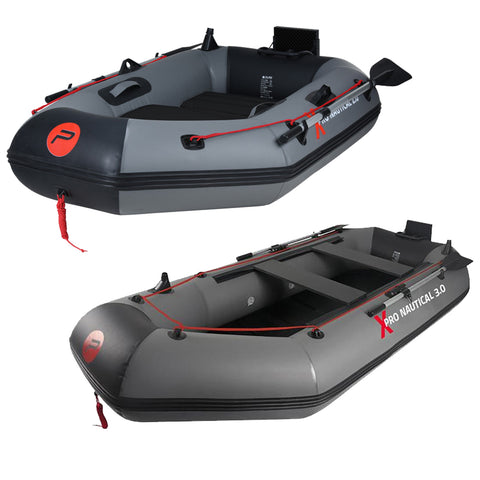 An inflatable boat is displayed with a dark gray exterior and black interior. It features a thick edge and is equipped with handles and oarlocks. It appears designed for water travel.