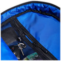 A blue backpack pocket contains a set of car keys and a remote, surrounded by a smooth interior fabric and a mesh compartment, suggesting organized storage.