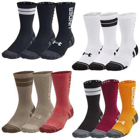 Four pairs of athletic socks arranged in two groups display various colors and designs including black white tan red and orange showcasing specific branding and patterns typical for sportswear.