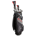 A golf bag stands upright featuring several clubs partially visible at the top while displaying a sleek black and gray design with red accents in a neutral indoor environment.