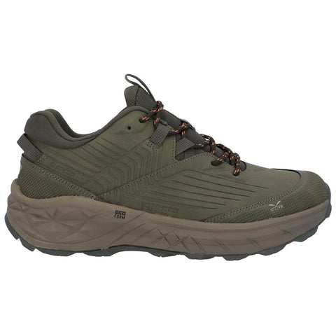 A green athletic shoe rests flat with a textured upper and laces. It features a cushioned sole labeled GEO FOAM and is designed for comfort and performance in outdoor activities.