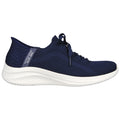 A navy blue sneaker with a textured design features laces and a thick white sole is displayed against a plain background. It is designed for casual wear and comfort.