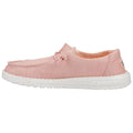 A pink slip-on shoe is positioned sideways with a white speckled sole it features a simple design with a decorative knot and a textured interior for comfort.