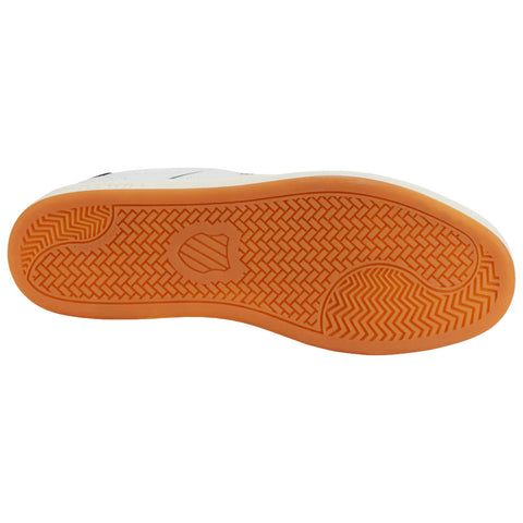 A shoe sole with a textured orange pattern is positioned flatly showing detailed grooves and parts that enhance grip this is set against a white background.