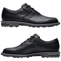 A pair of black golf shoes is displayed side by side showcasing their sleek leather design with a low profile and textured details on the upper and sole designed for traction.