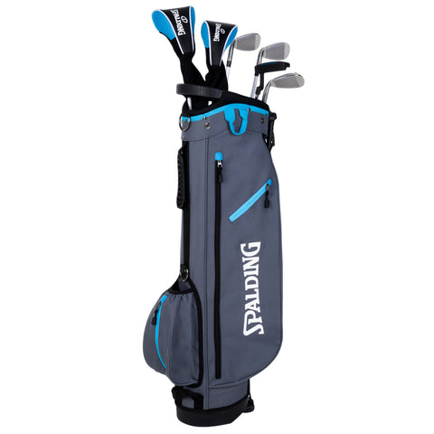 A golf bag stands upright containing golf clubs with their grips visible protruding from the top while featuring a gray exterior with blue accents and a side pocket for storage.