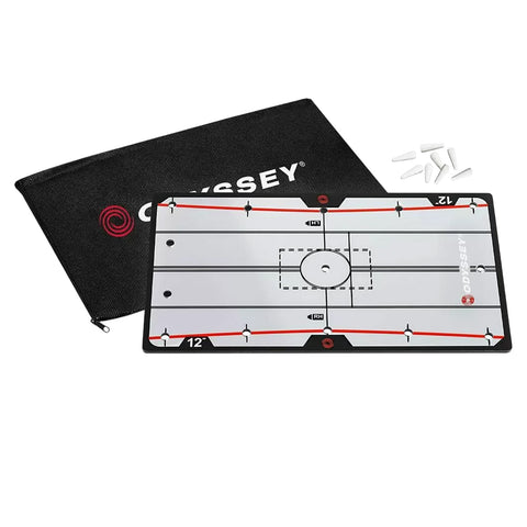 A rectangular putting alignment mat displays a target circle and guiding lines for practice it sits next to a black storage pouch labeled Odyssey and six markers are nearby