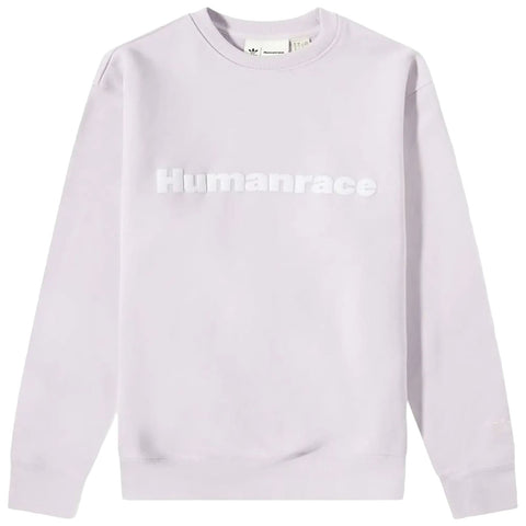 A light purple sweatshirt is displayed featuring the word Humanrace in bold white letters across the chest positioned against a plain background highlighting the garment's soft fabric and minimalist design