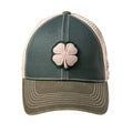 A green baseball cap features a prominent four-leaf clover emblem stitched on the front with a mesh back and an olive-green brim situated against a plain white background.