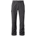 Dark gray cargo pants are displayed standing upright featuring multiple pockets and a relaxed fit designed for outdoor activities in a casual setting.