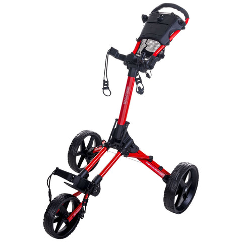 A red golf push cart stands upright with three wheels and a handlebar at the top. It is designed for transporting golf clubs and equipment on the course.