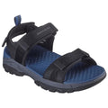 A black sandal has adjustable straps securing it to the foot featuring a cushioned blue insole designed for comfort in outdoor settings. The sole is rugged for traction.