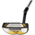 A golf putter with a sleek black and silver design rests on a flat surface showcasing a yellow accent and the brand name MacGregor along with model number details and texture patterns for grip.