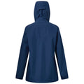 A blue rain jacket is displayed featuring a hood and long sleeves with a smooth fabric texture the jacket is positioned upright against a plain background.