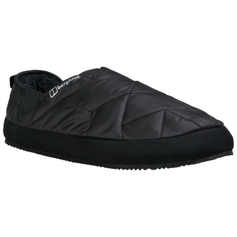 A black quilted slipper designed for indoor comfort rests on a surface featuring a soft fabric lining and a rubber sole, suitable for casual home wear.