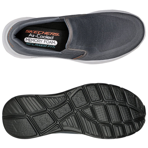 A pair of gray slip-on shoes is displayed with a textured fabric upper and a thick black rubber sole emphasizing comfort and flexibility. The brand name and features are visible inside.