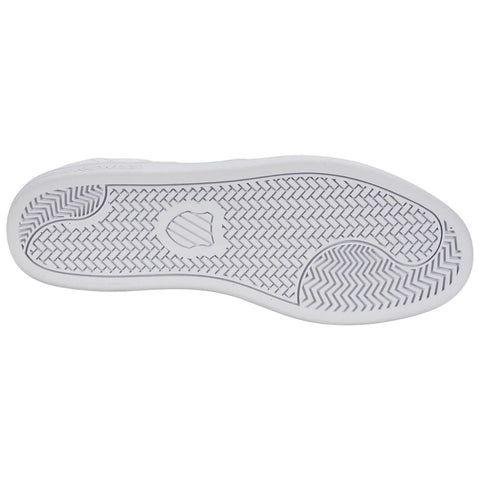 A white shoe sole with a textured pattern is displayed facing down on a neutral background emphasizing its design and grip features without any surrounding context or visible elements.