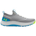 A gray athletic shoe is displayed with a slip-on design featuring blue and green accents while the textured upper and thick sole suggest comfort and traction for sports activities.