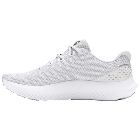 A light gray athletic shoe features a mesh upper with subtle detailing and a thick white sole designed for comfort and performance in an urban or fitness setting.