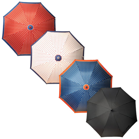 Four umbrellas are displayed. The first is red with white polka dots. The second is white with red polka dots. The third is blue with white polka dots. The fourth is plain black.