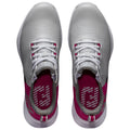 Gray athletic shoes are positioned with laces secured showcasing a vibrant pink interior and patterned insoles set against a plain background emphasizing their design and features.