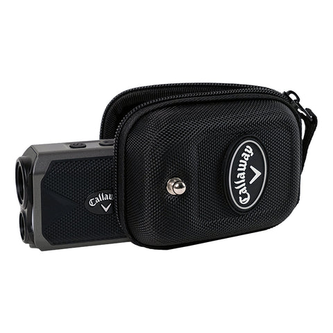 A black carrying case holds a compact rangefinder device with two lens openings facing forward and a textured surface for grip placed on a flat surface.