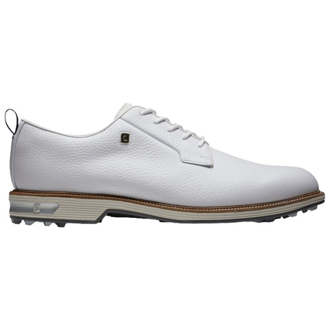 A white leather golf shoe features a classic lace-up design with a textured surface and a light gray sole. Designed for performance on a golf course, it has a sleek silhouette.