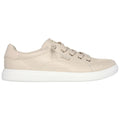 Beige leather sneaker with a white rubber sole is positioned horizontally showing laces and rounded toe against a plain white background