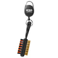 A golf accessory with a retractable reel features a black handle and a dual-bristle brush with orange and black nylon and brass bristles for cleaning golf clubs.