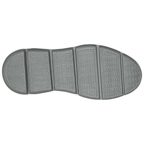 A shoe sole displays a textured pattern designed for grip with sections divided by ridges emphasizing durability and wear resistance against a neutral background