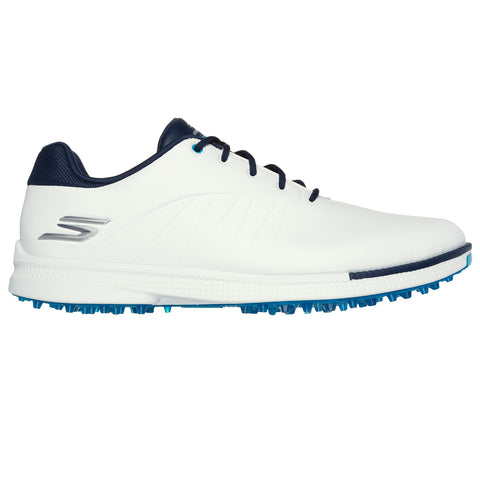 A white athletic shoe with blue accents sits on a flat surface showcasing its spiked sole designed for traction in sports activities emphasizing a sleek modern design.