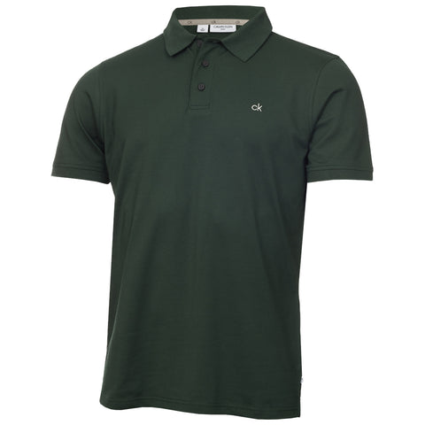 A dark green polo shirt with a collar and three buttons is displayed. The shirt features a small logo on the left side and is set against a plain white background.