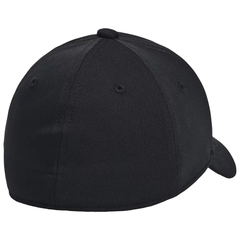 A black baseball cap is shown lying flat with the back facing up revealing its smooth fabric surface and stitched details while the brim curves gently downward