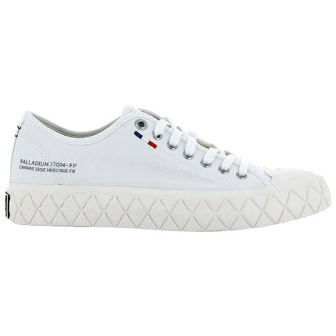 White canvas sneakers with a textured rubber sole feature laces and small decorative elements indicating brand identity set against a plain backdrop suggesting a focus on footwear design.