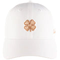 A white baseball cap features a rose gold embroidered four-leaf clover on the front showcasing a casual accessory for outdoor wear or sun protection.