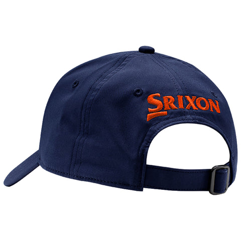 A navy baseball cap features an orange embroidered logo on the side and an adjustable strap located at the back designed for comfort and fit in casual outdoor settings.