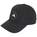 A black baseball cap displays a circular logo featuring three stripes and the text Adidas Golf The Brand. The cap is designed for casual or athletic wear.