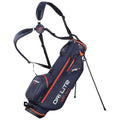 A navy and orange golf stand bag features adjustable straps and a reinforced base. The bag stands upright with legs extended, designed for carrying clubs on a golf course.