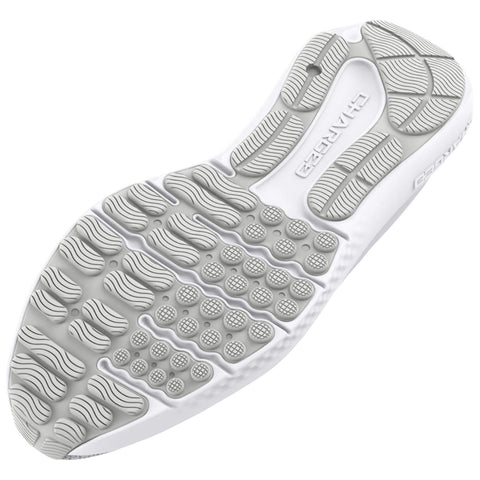 A sneaker outsole is displayed prominently showing a textured surface with various grip patterns designed for traction during movement in athletic environments. The material appears flexible and durable.