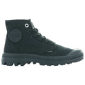 A black high-top boot with a textured rubber sole and canvas upper is positioned sideways on a neutral background showcasing its laces eyelets and contrasting rubber toe cap.