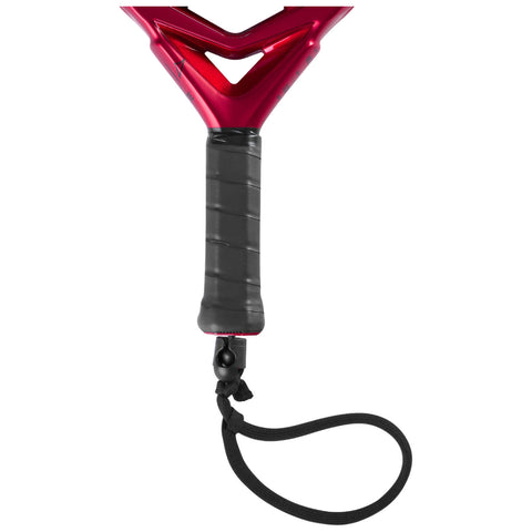 A red sports equipment handle with a textured black grip is positioned vertically with a black lanyard attached to the bottom end for secure handling during use.