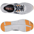 A pair of athletic shoes features a white mesh upper with black accents and orange eyelets The shoes have a textured sole with a distinctive orange and white pattern and branding visible inside