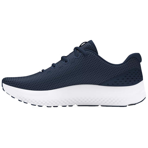 A navy blue athletic shoe with a textured upper and white outsole is displayed sideways showcasing its design and contours against a plain background